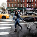 Alisha Narvaez, a funeral services worker, transports a body in Harlem..jpg